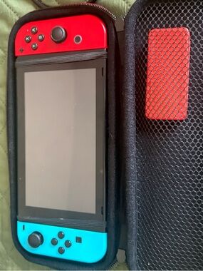 Nintendo Switch with Neon Red & Neon Blue Joy‑Con